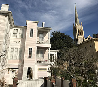 Rose Hill Inn rear view with church spire in background